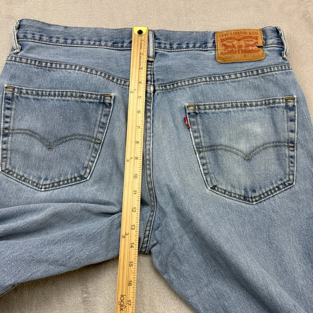 Levi's 550 Relaxed Fit Jeans Mens 36x34 Light Wash Blue Denim Tapered Leg Baggy